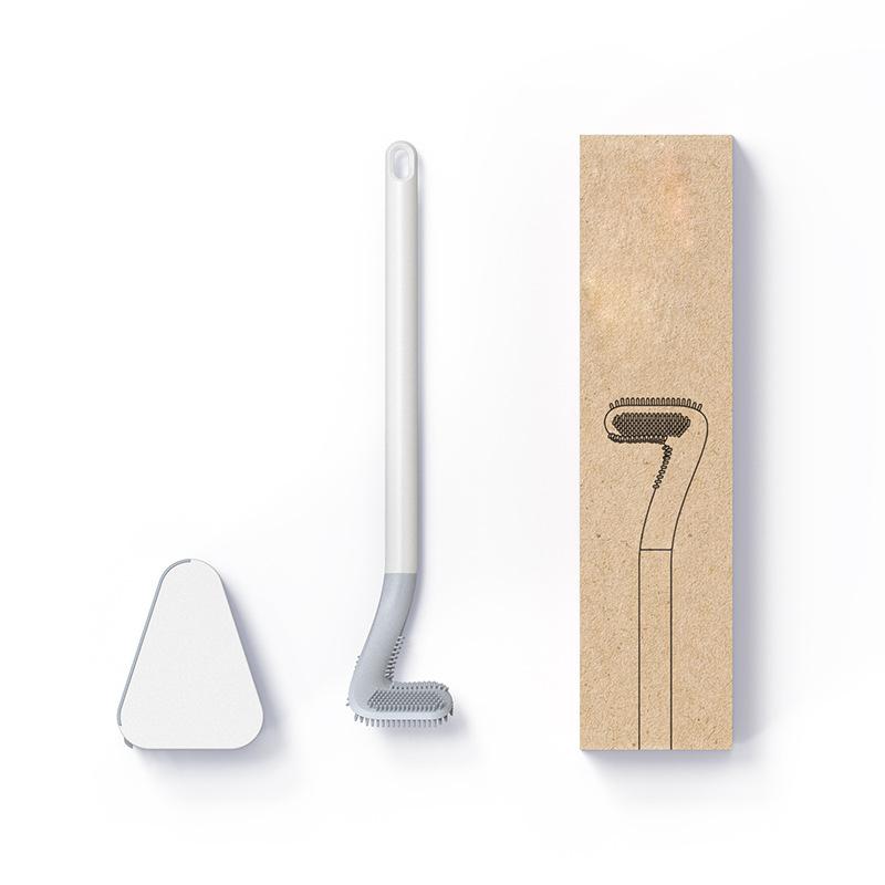 Brosse WC avec support dans une salle de bains claire