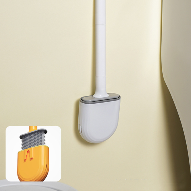 Les quatre coloris de la brosse WC : blanc, bleu, orange et vert