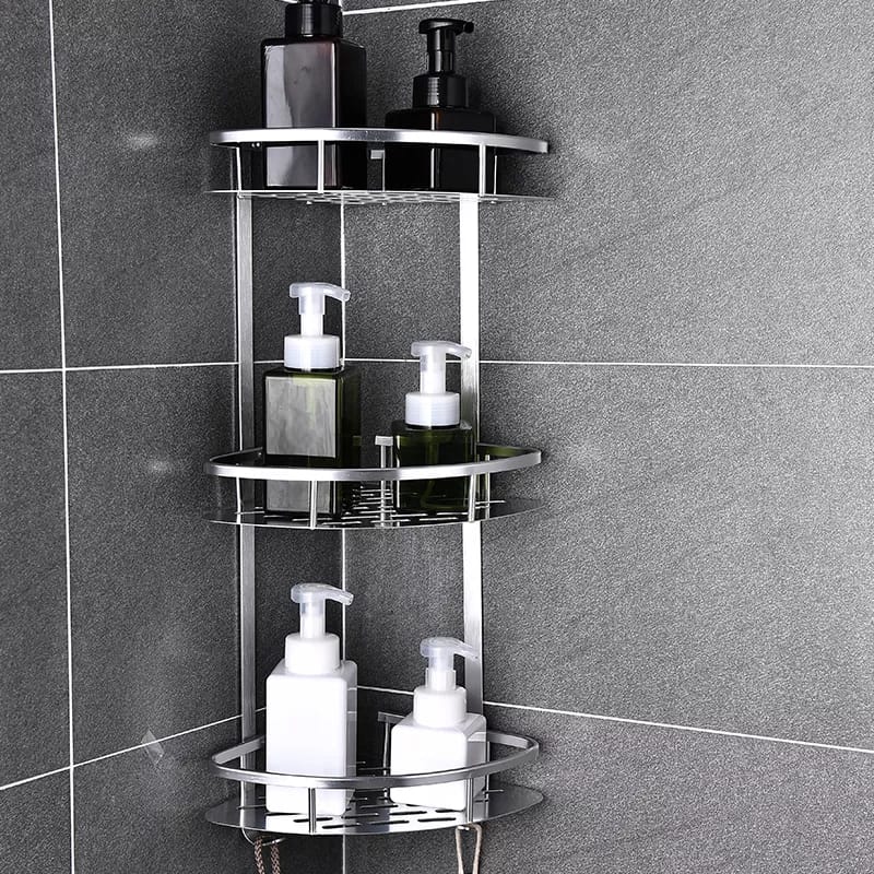 Étagère d'angle de douche à trois niveaux en aluminium fixée dans un coin de salle de bains