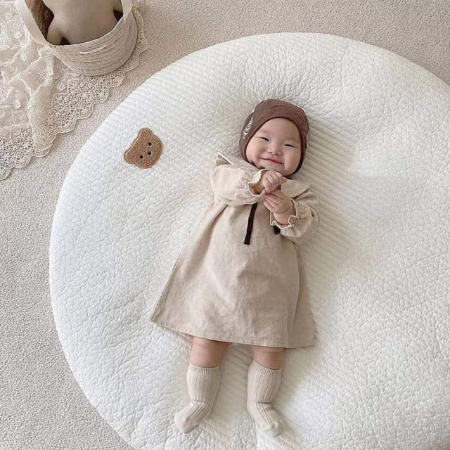 Tapis de jeu rond en coton rose brodé