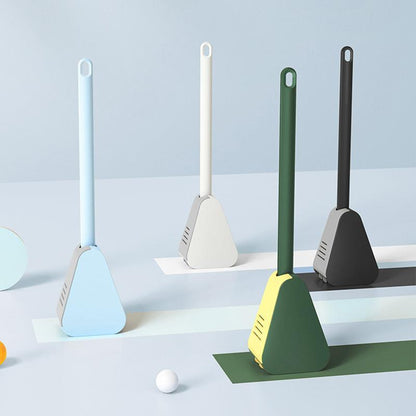 Brosse WC nettoyant le rebord d'une cuvette