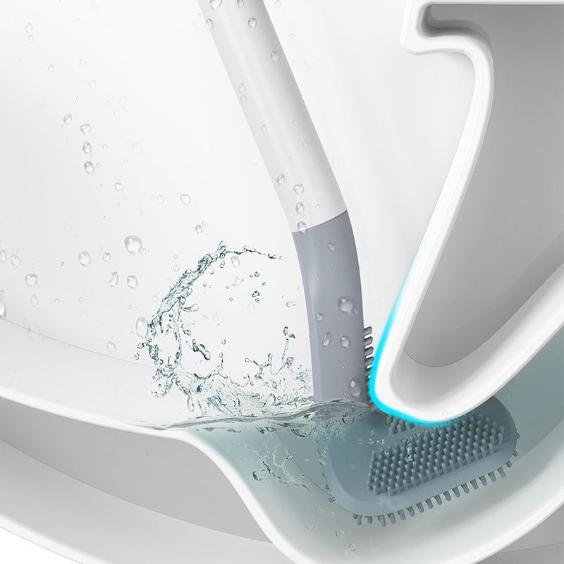 Support adhésif de la brosse WC fixé derrière la cuvette