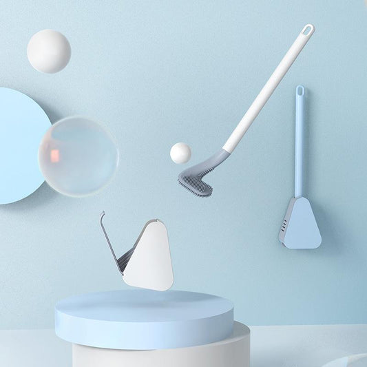 Brosse WC à tête triangulaire posée dans son support
