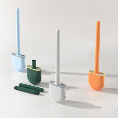 Brosse WC en cours d'utilisation sous la bordure de la cuvette