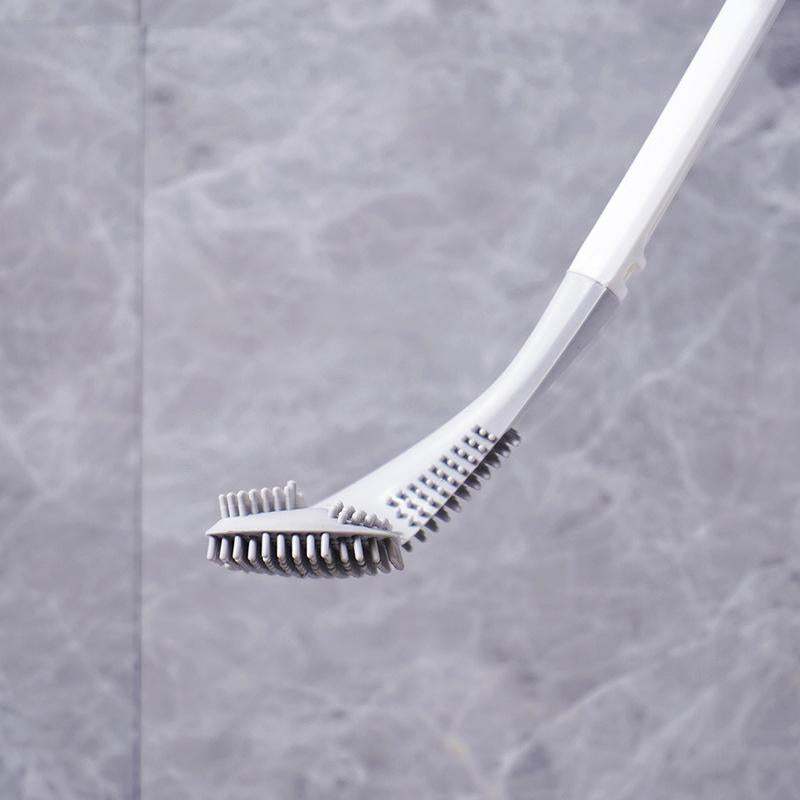 Brosse WC rangée dans son support au-dessus du sol