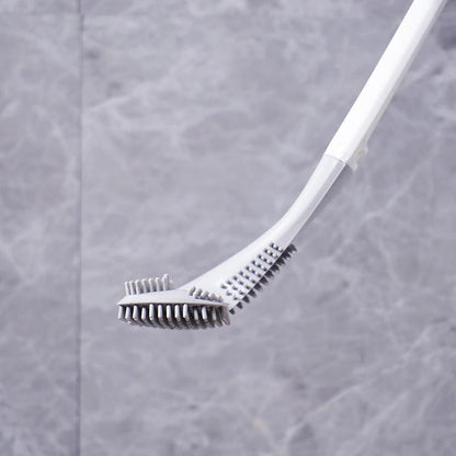 Brosse WC rangée dans son support au-dessus du sol