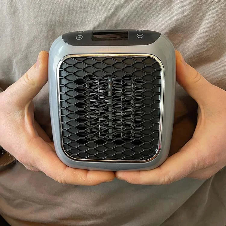 Chauffage d'appoint portable tenu d'une seule main