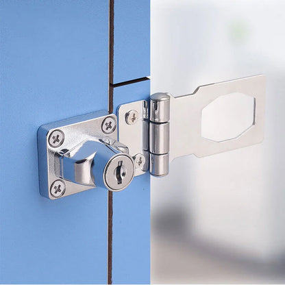 Verrou de porte à clé posé sur une porte, mécanisme à rotation de 90°