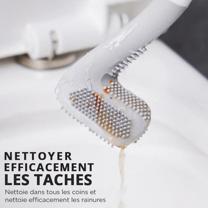 Brosse WC noire fixée au mur à côté de la cuvette