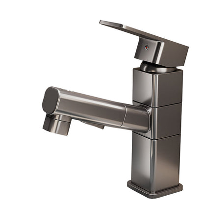 Robinet de lavabo gris à bec rond pivotant, jet orienté vers le fond de la vasque