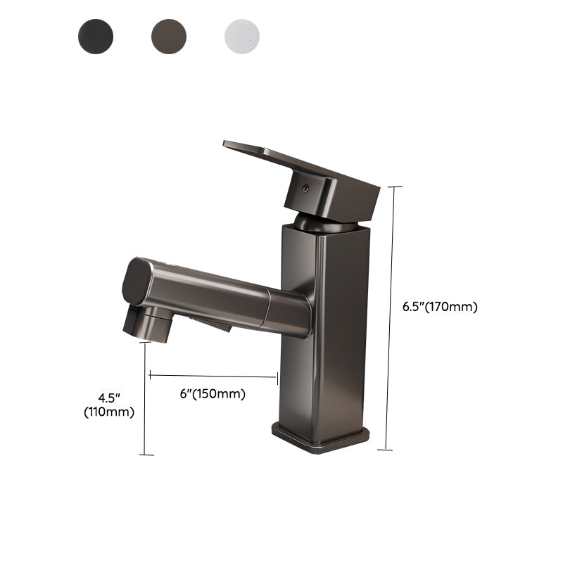 Robinet de lavabo gris à bec rond pivotant, douchette extractible sortie de son logement