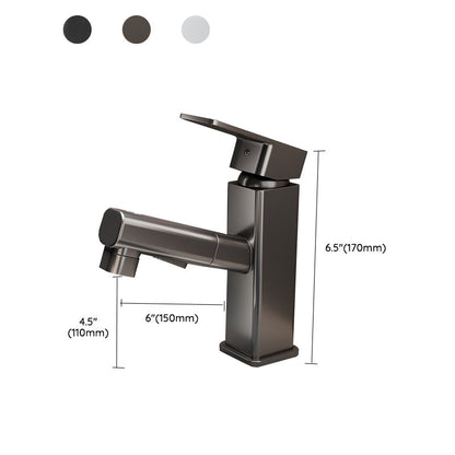 Robinet de lavabo gris à bec rond pivotant, douchette extractible sortie de son logement