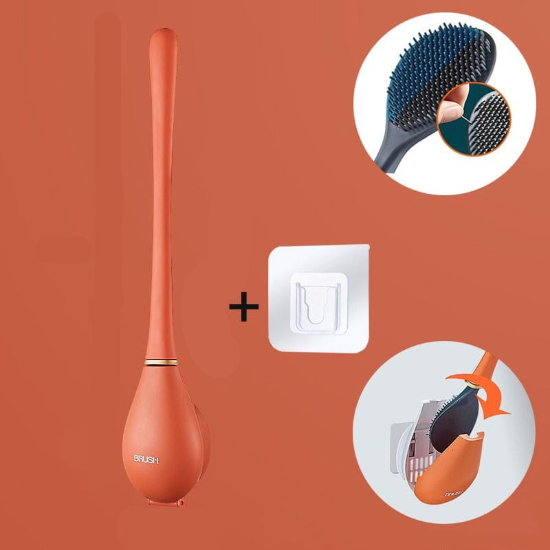 Brosse WC en silicone posée au sol dans son support
