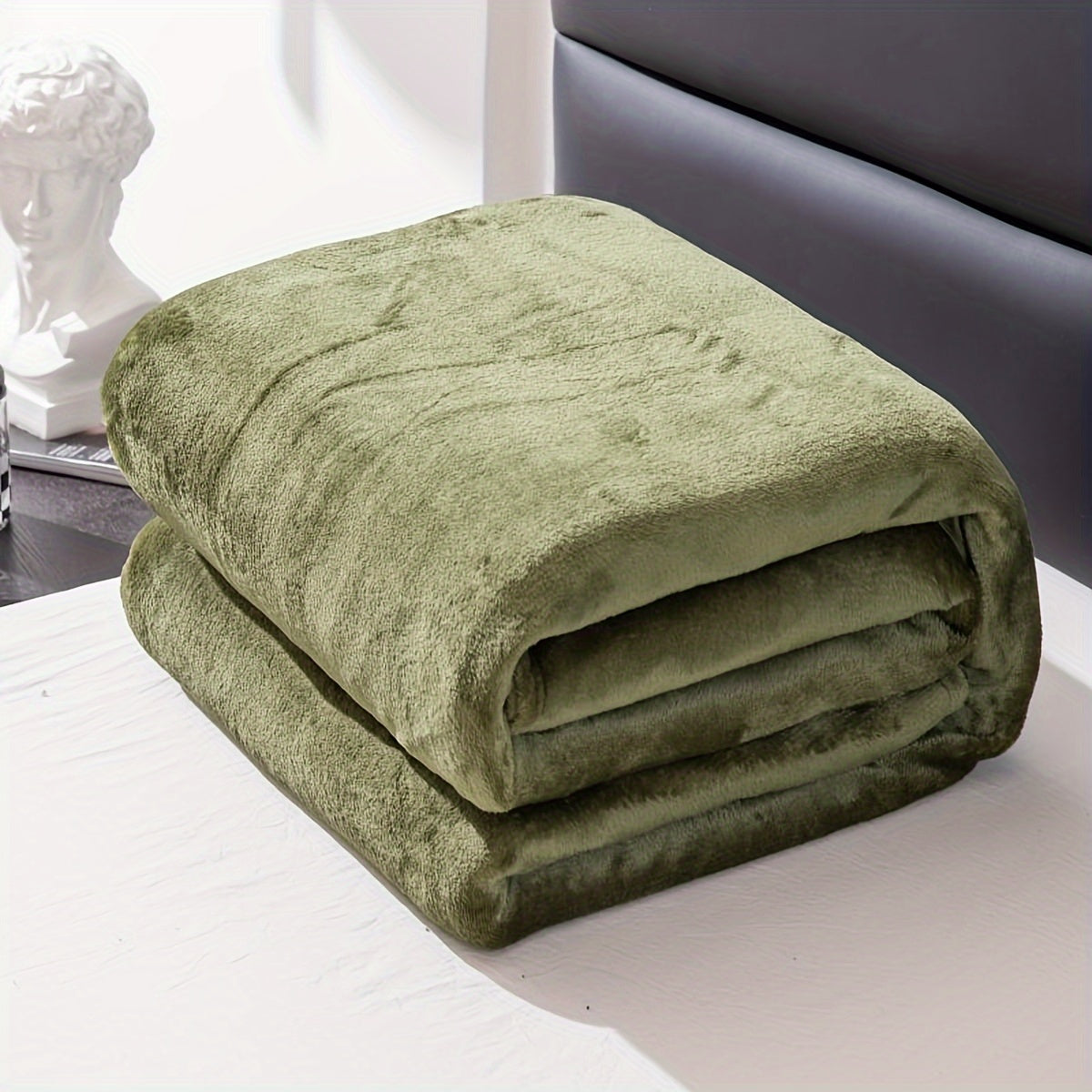 Grand format de la couverture recouvrant un lit double