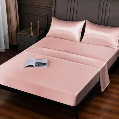 Parure de lit en soie de glace coloris rose pâle sur un lit double