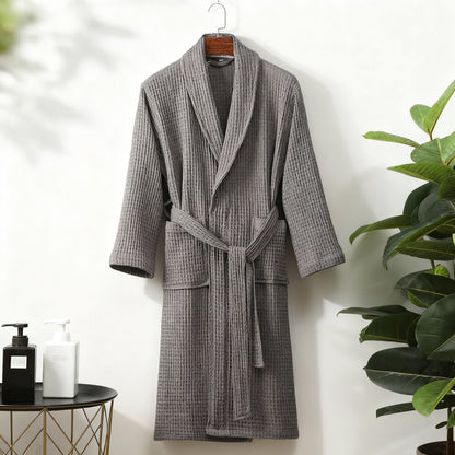 Détail d'une poche du peignoir de bain en coton