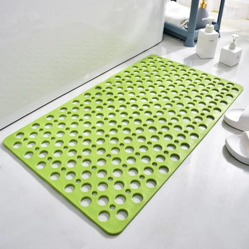 Tapis de douche antidérapant vert avec trous d'évacuation ronds