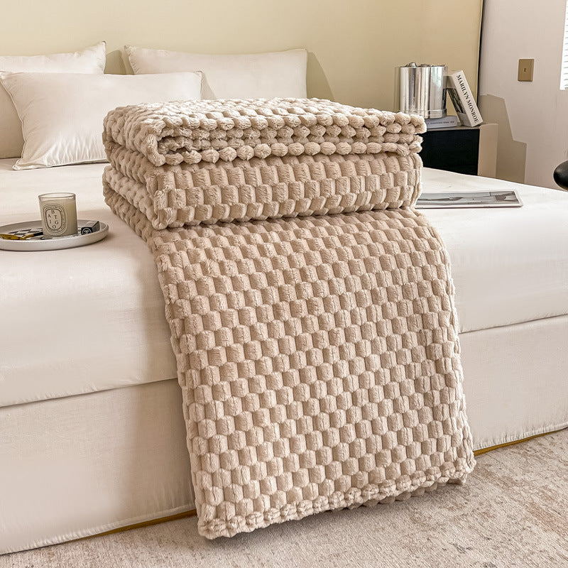 Plaid texturé déplié, relief en maille visible sur toute la surface