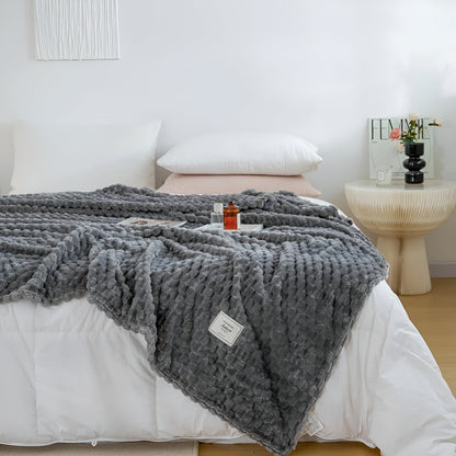 Texture douce de la microfibre du plaid, vue rapprochée