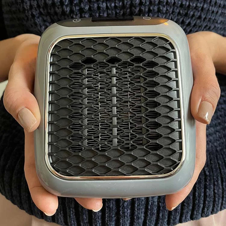 Chauffage d'appoint portable posé au sol d'une pièce
