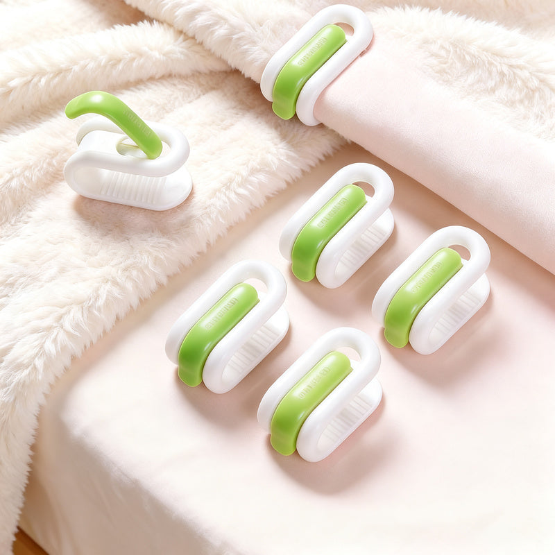 Pinces à couette coloris vert et blanc sans aiguille pour maintenir la couette