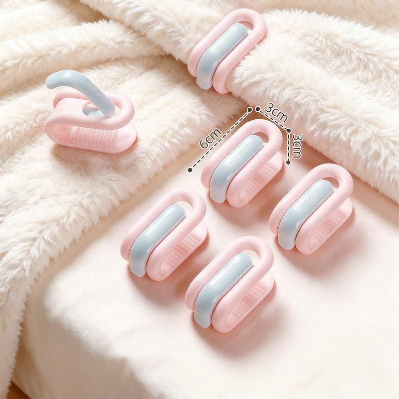Pinces à couette coloris bleu et rose sans aiguille pour maintenir la couette