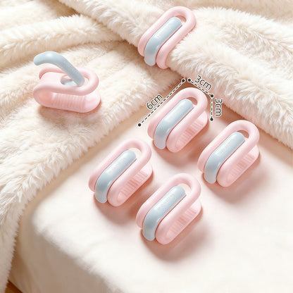 Pinces à couette coloris bleu et rose sans aiguille pour maintenir la couette