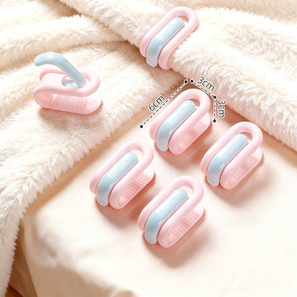 Pinces à couette coloris bleu et rose sans aiguille pour maintenir la couette