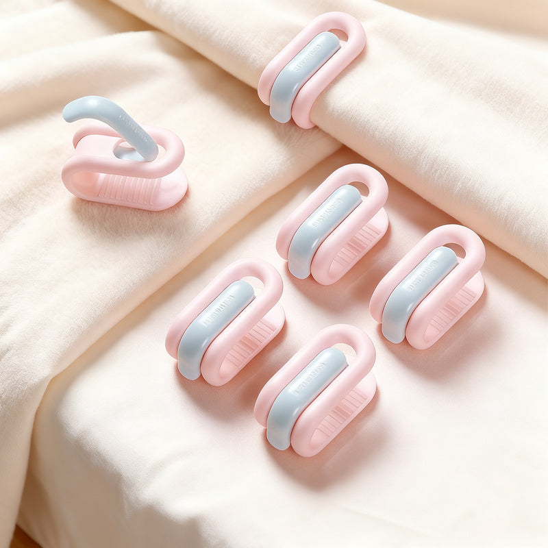 Pinces à couette coloris bleu et rose sans aiguille pour maintenir la couette
