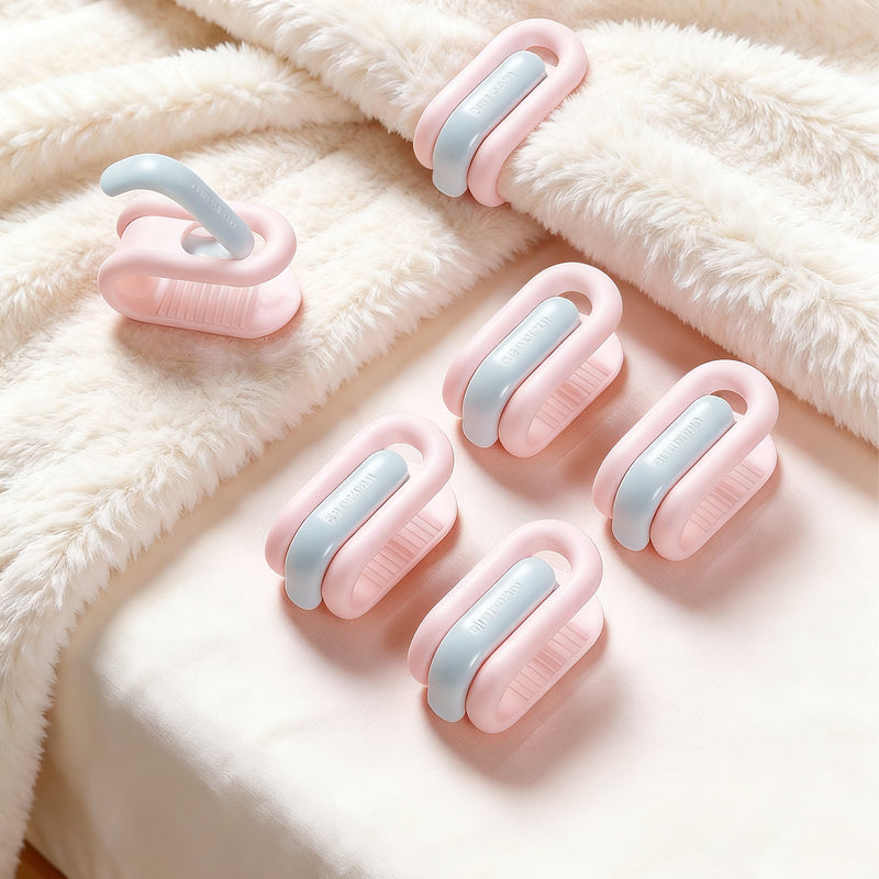 Pinces à couette coloris bleu et rose sans aiguille pour maintenir la couette