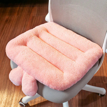 Coussin de chaise avec dossier rose installé sur une chaise