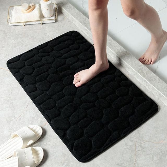 Tapis de bain décliné en blanc, gris, marron clair, marron et noir