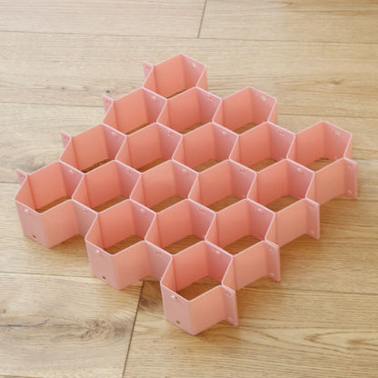 Séparateur de tiroir alvéolé rose, casiers hexagonaux assemblés