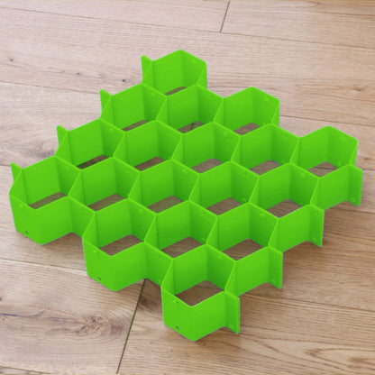 Séparateur de tiroir alvéolé vert, casiers hexagonaux assemblés