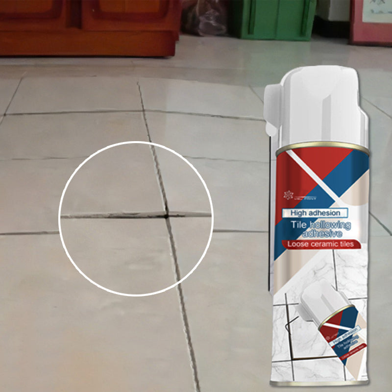 Application de la colle dans un joint de carrelage