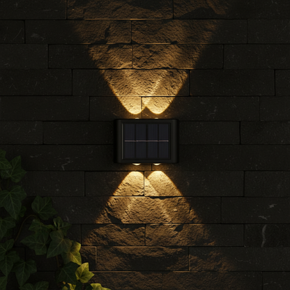 Applique solaire Éclat sur un mur en pierre sombre